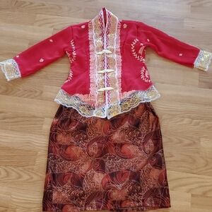 Red and Brown Girl Batik Kebaya